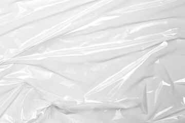 plastic overlay texture of realistic crumpled transparent plastic film wrap on black...