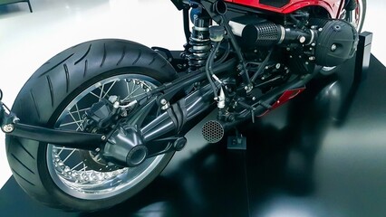 Side view of rear wheel of exposed luxury motorcycle