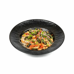 A black bowl with stir-fried noodles, chicken, and colorful vegetables, garnished with sesame seeds and green onions