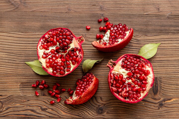 Fresh ripe pomegranate with half and pieces ready for eating. Top view