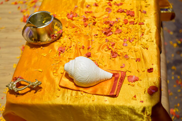 Top view Objects of Aarti ceremony used by Pujaris on Ganges on golden table
