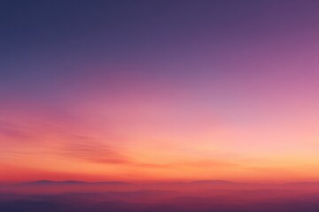 Obraz premium Sunrise/sunset over a misty mountain range