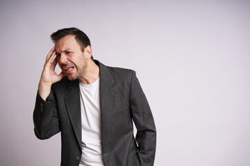 Male Model Showing Different Emotions on White Studio Background