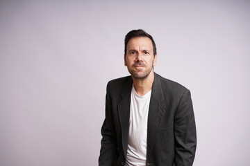 Male Model Showing Different Emotions on White Studio Background