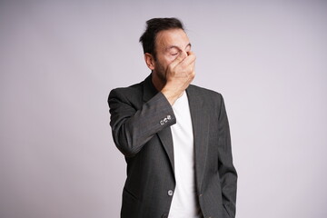 Male Model Showing Different Emotions on White Studio Background