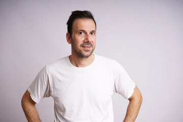 Obraz premium Male Model Showing Different Emotions on White Studio Background