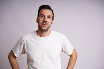 Fototapeta premium Male Model Showing Different Emotions on White Studio Background