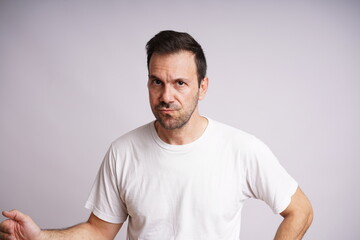 Male Model Showing Different Emotions on White Studio Background