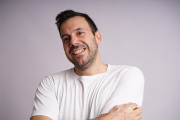 Fototapeta premium Male Model Showing Different Emotions on White Studio Background