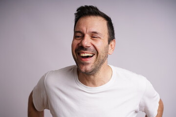 Male Model Showing Different Emotions on White Studio Background