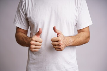 Expressive Male Hands on White Background in Studio Lighting