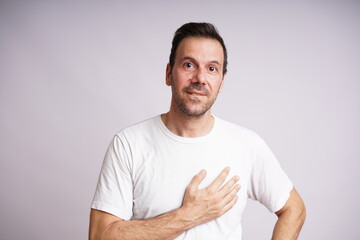Fototapeta premium Male Model Showing Different Emotions on White Studio Background