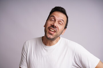 Male Model Showing Different Emotions on White Studio Background