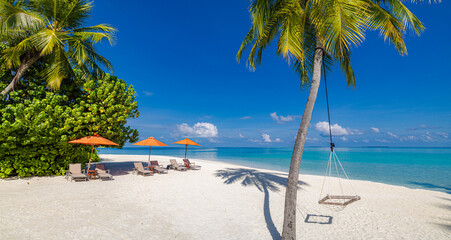 Inspire tropical beach resort pool palm trees chairs umbrellas leisure tourism sunny blue sky. Stunning sea view beach landscape. Summer vacation amazing coastal relaxation. Closeup sunshine sand wave