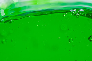 Water wave, close up of vibrant green liquid with bubbles, capturing dynamic movement and freshness. Perfect for backgrounds, beverages, or abstract concepts. soft drink