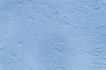 Beautiful uneven blue texture. Neutral decorative background.
