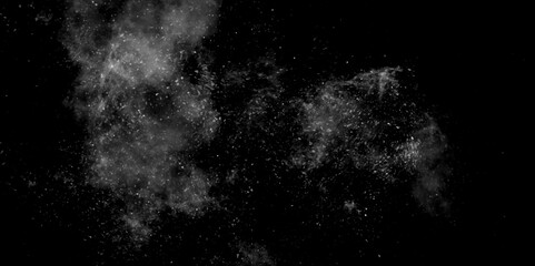 Gray dust Particle ink splash abstract design background. Dark background with white and gray smokey particle white dust is scattered by white cluster explosion on a black background.