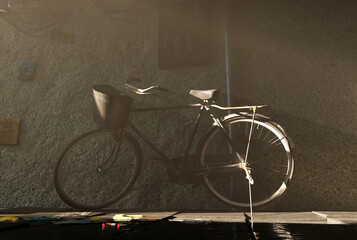 Old Bicycle Parked beside Stone Wall, 3d render
