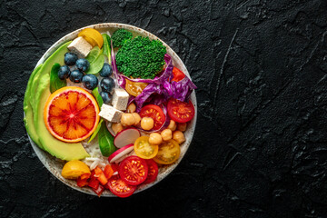 Buddha Bowl. Rainbow salad. Vegan poke bowl with avocado. Healthy food. Overhead flat lay shot with a place for text