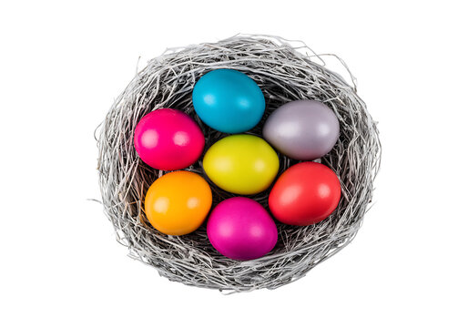 Colorful easter eggs in a bird's nest on black background, On Transparent Background