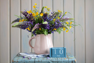 Lupine bouquet celebrating july 10th with rustic charm