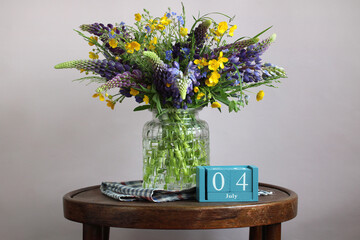 Wildflower bouquet celebrating fourth of july in glass vase