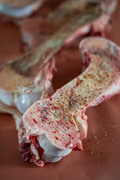 raw beef marrow bones, with salt and pepper seasoning