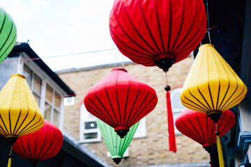 Colorful chinese lanterns hanging outdoors, celebrating culture and festivities