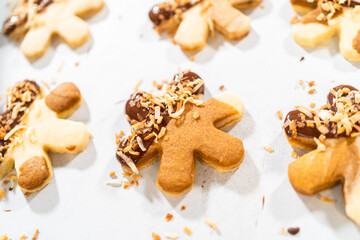 Chocolate-Dipped Gingerbread Men with Golden Toasted Coconut