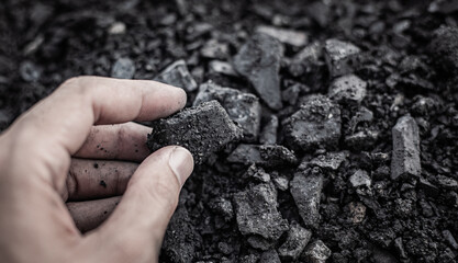 coal in the hand. Coal in the Hand of Miners. Mining Industry Concept. Heavy Industry. Heating....