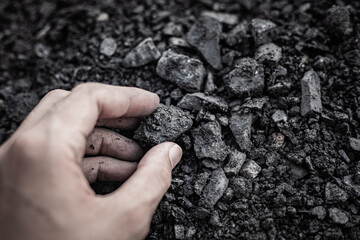 coal in the hand. Coal in the Hand of Miners. Mining Industry Concept. Heavy Industry. Heating....