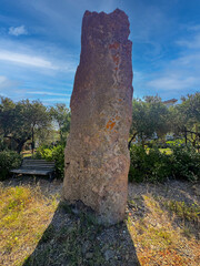 Ancient standing stone Menhir of Luxia Arrabiosa in southern Sardinia