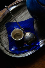 silver ware  and blue plate for tea ceremony