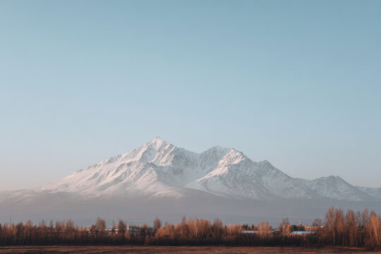 breathtaking view of mount apatity during stunning sunset with warm hues illuminating sky