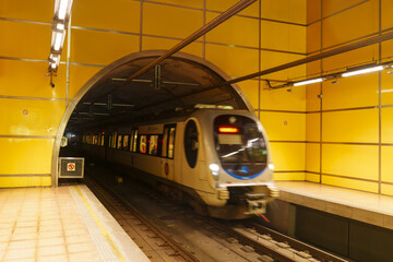 The train in the Donostia city subway was moving fast, going through a tunnel, Euskadi
