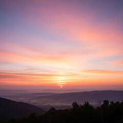 Fototapeta premium Stunning Mountain Sunset with Layers of Orange, Pink, and Purple Hues Across the Sky and Silhouetted Peaks, Creating a Serene Landscape