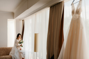 portrait of a bride in the morning before the wedding