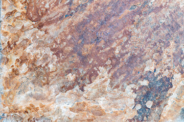 Closeup of grunge metal with flaking paint.