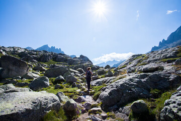Young hiker woman in Vall de Boi, Aiguestortes and Sant Maurici National Park, Spain