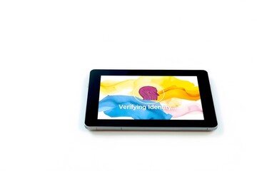Obraz premium Identity verification request on screen displayed on tablet device 