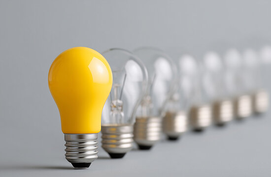 Row of light bulbs with only one illuminated, symbolizing a unique idea
