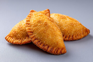 two pastries are sitting on a table