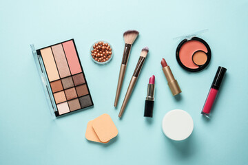 Beauty products on blue background.