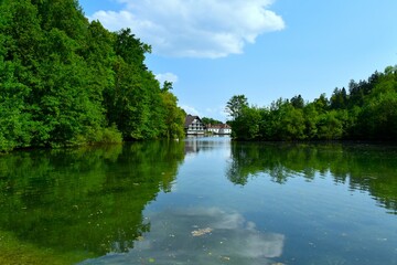 Fototapeta premium View of Črnava lake near Preddvor and Hrib castle at the shore in Gorenjska, Slovenia