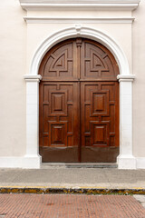 old wooden door in a stone wall
