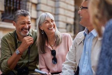 Senior friends laughing outdoor
