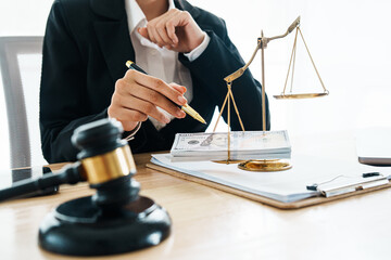 A professional lawyer advises a client in a legal office, reviewing contracts and justice symbols...