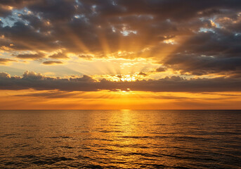 Fototapeta premium Golden Sunset over Calm Ocean Waters Dramatic Sky Cloudscape