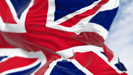Fototapeta premium Close-up of national flag of the United Kingdom waving in the wind