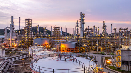 Oil and gas industrial refinery at night, Oil and gas refinery petrochemical plant pipeline steel, Oil and gas refinery factory oil and gas storage tank pipeline steel at night, Global energy refinery